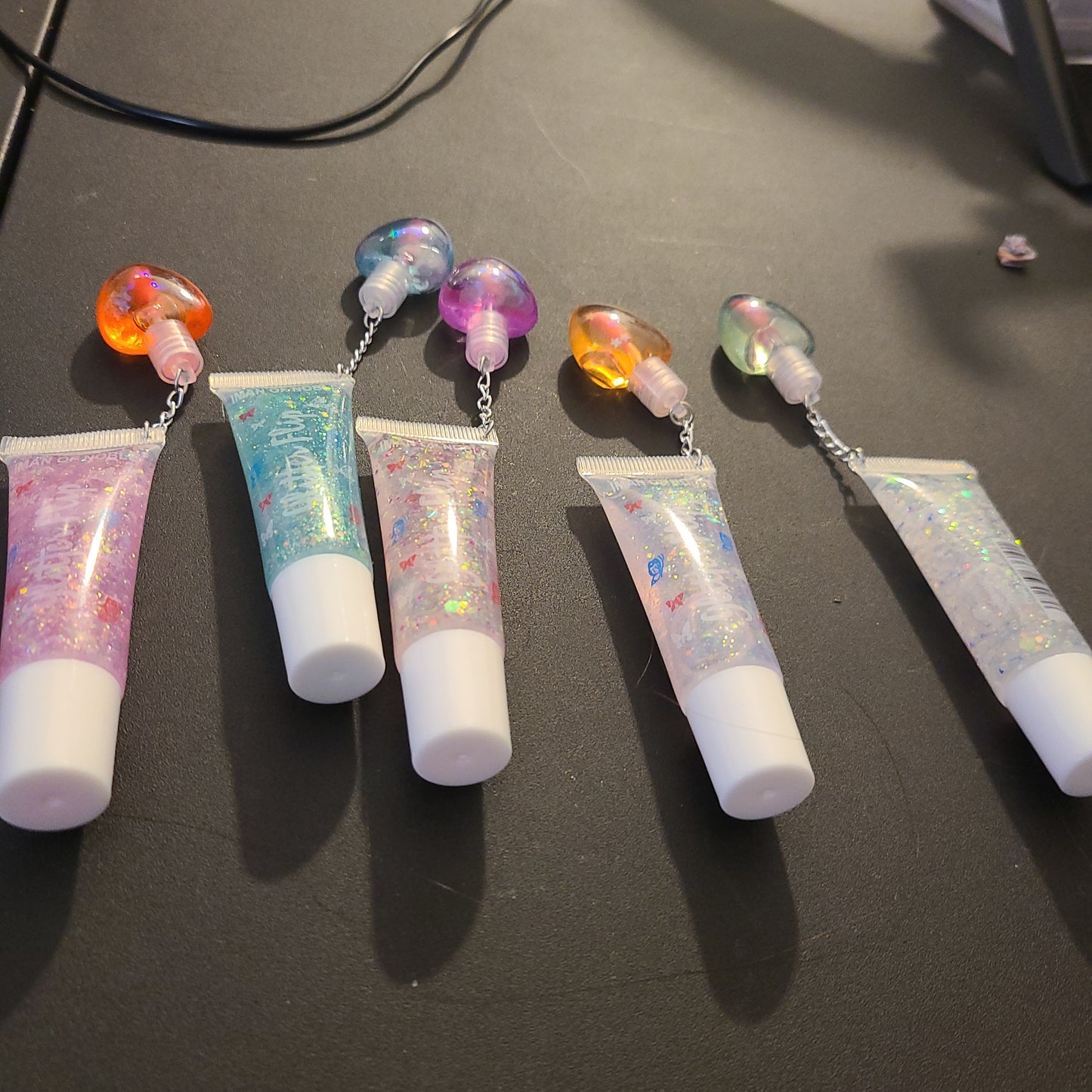 Glitter flip lip oils