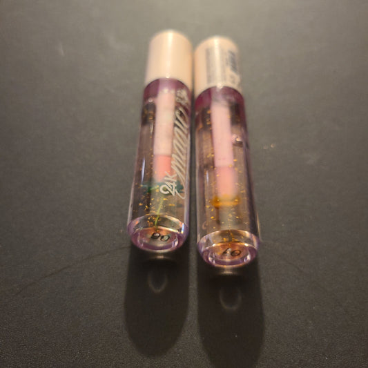 24k magic lip oils
